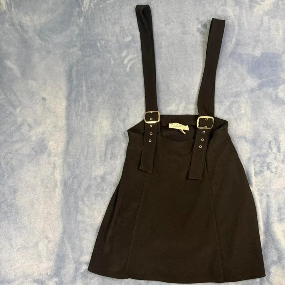 Vintage Stella black mini skirt with gold‎ buckles Size M